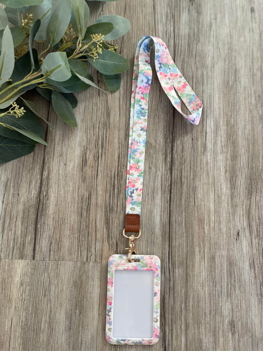 Flower Lanyard which includes a ID Card holder to keep your identity safe. Personalise with a range of accessories.