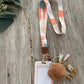Lanyard with Autumn tones and ID card holder. 