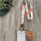 Lanyard with autumn tones and ID card holder. 
